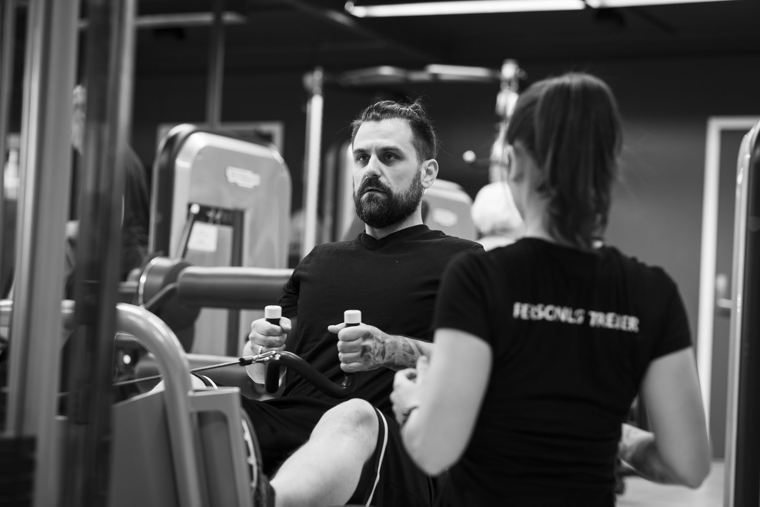 Personlig trener som følger opp et medlem hos Trimfit